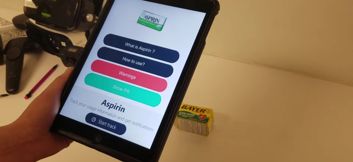 tablet showing Aspirin in augmented reality